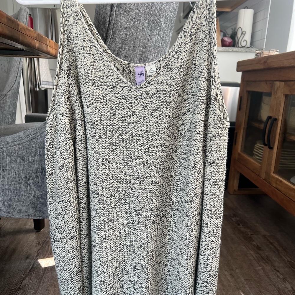 Francesca’s open shoulder sweater